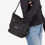sac-a-dos-convertible-bandouliere-janna-noir-porte2
