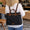 sac-a-main-sac-a-dos-femme-reno-noir-porte