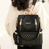 sac-antivol-femme-chic-Beverly-noir-porte