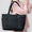 sac-cabas-matelasse-Kayla-noir-porte