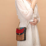 mini-sac-bandouliere-femme-cuir-Pacora-porte