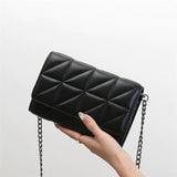 sac-matelasse-noir-Sigrid-chaine